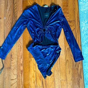 Blue shimmery body suit - brand new. Never worn.